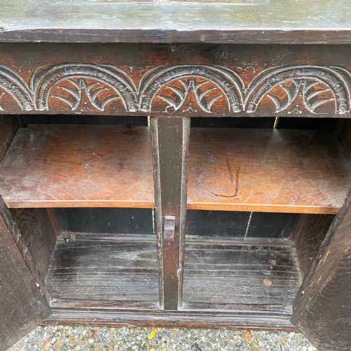 SMALL CARVED OAK CUPBOARD DATED 1680 - ADDITIONAL PHOTO 1