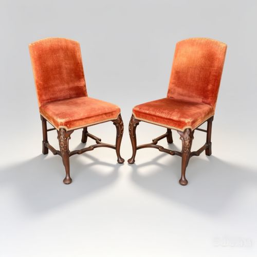 PAIR OF GEORGE II STYLE UPHOLSTERED AND CARVED WALNUT SIDE CHAIRS