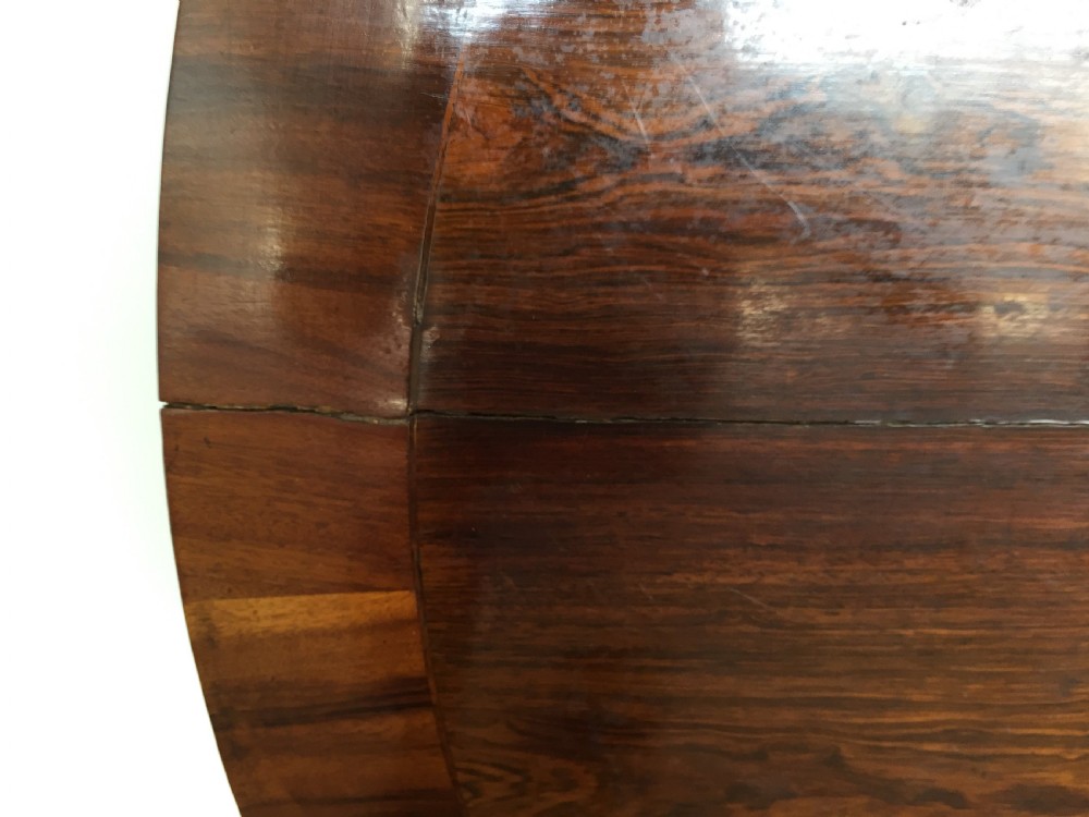 Circular rosewood breakfast or centre table with calamander crossbanding  View IX