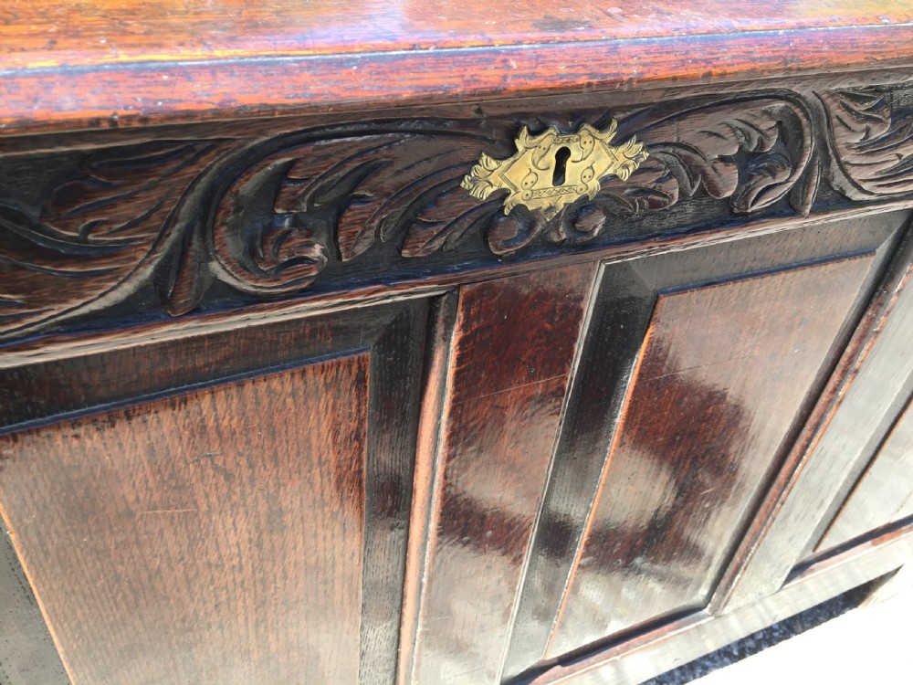 Large 17th Century oak coffer with carved front and good colour View II