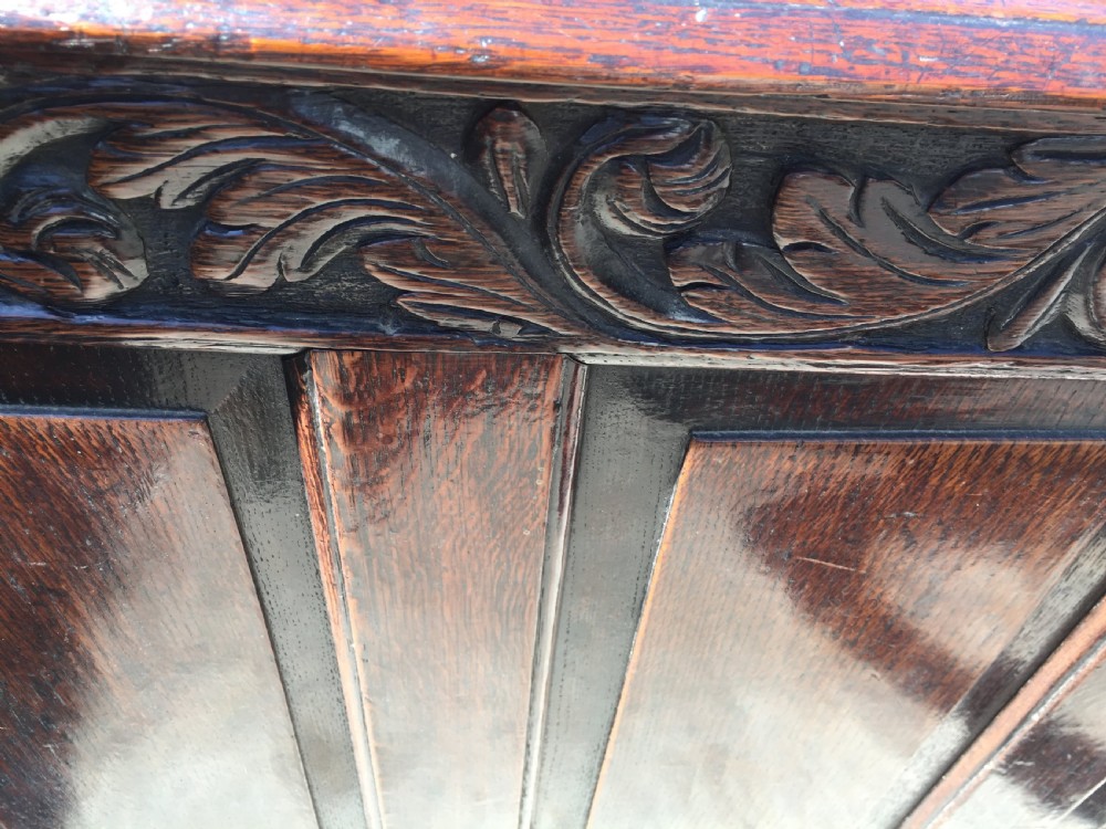 Large 17th Century oak coffer with carved front and good colour View III