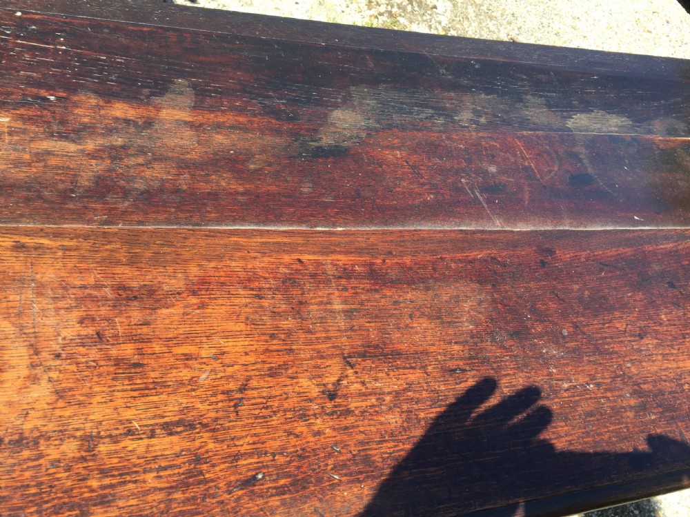 Large 17th Century oak coffer with carved front and good colour View V