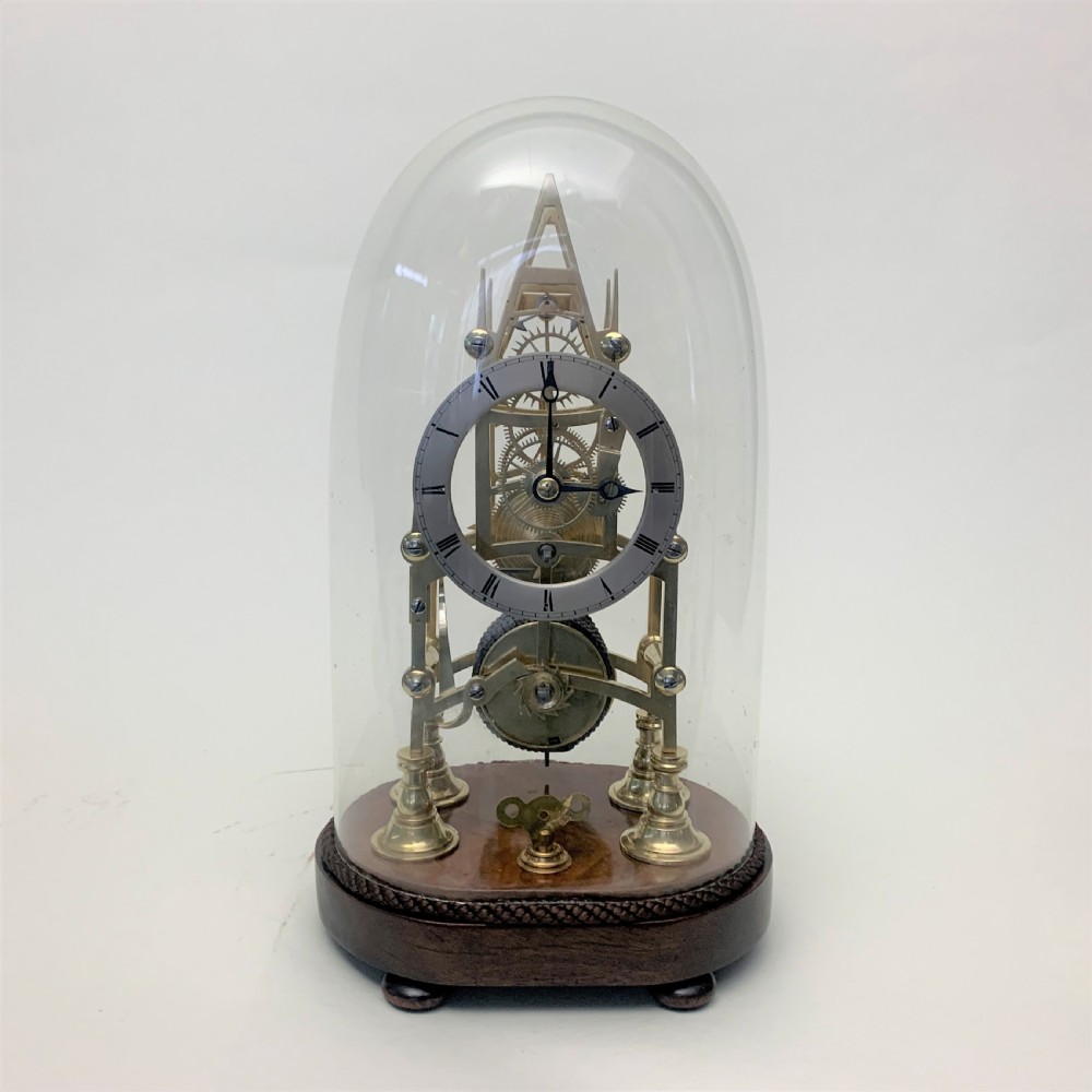 Brass skeleton clock in glass dome View IX