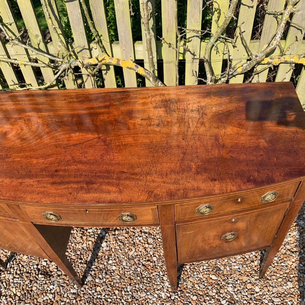 Small Georgian mahogany bow fronted sideboard View IV