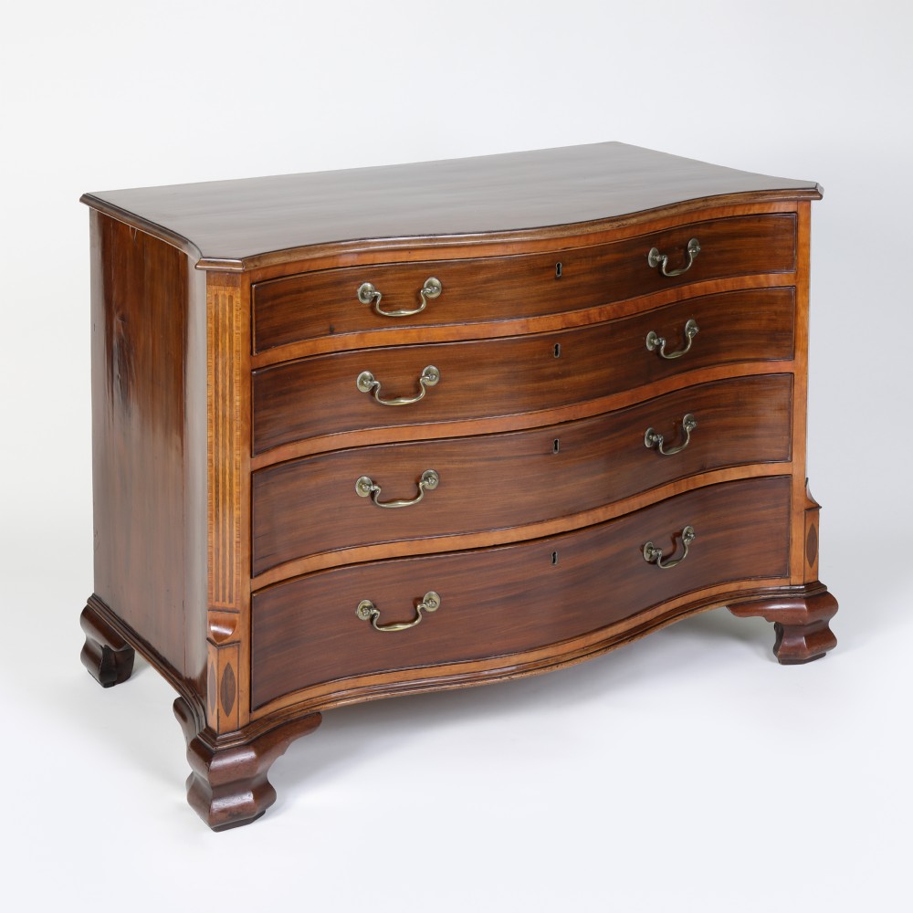 Georgian serpentine shaped mahogany and satinwood chest of drawers View VII