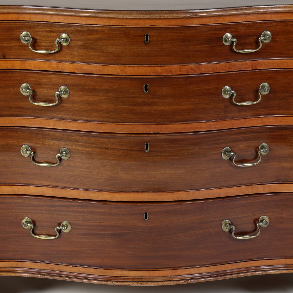 Georgian serpentine shaped mahogany and satinwood chest of drawers View XV