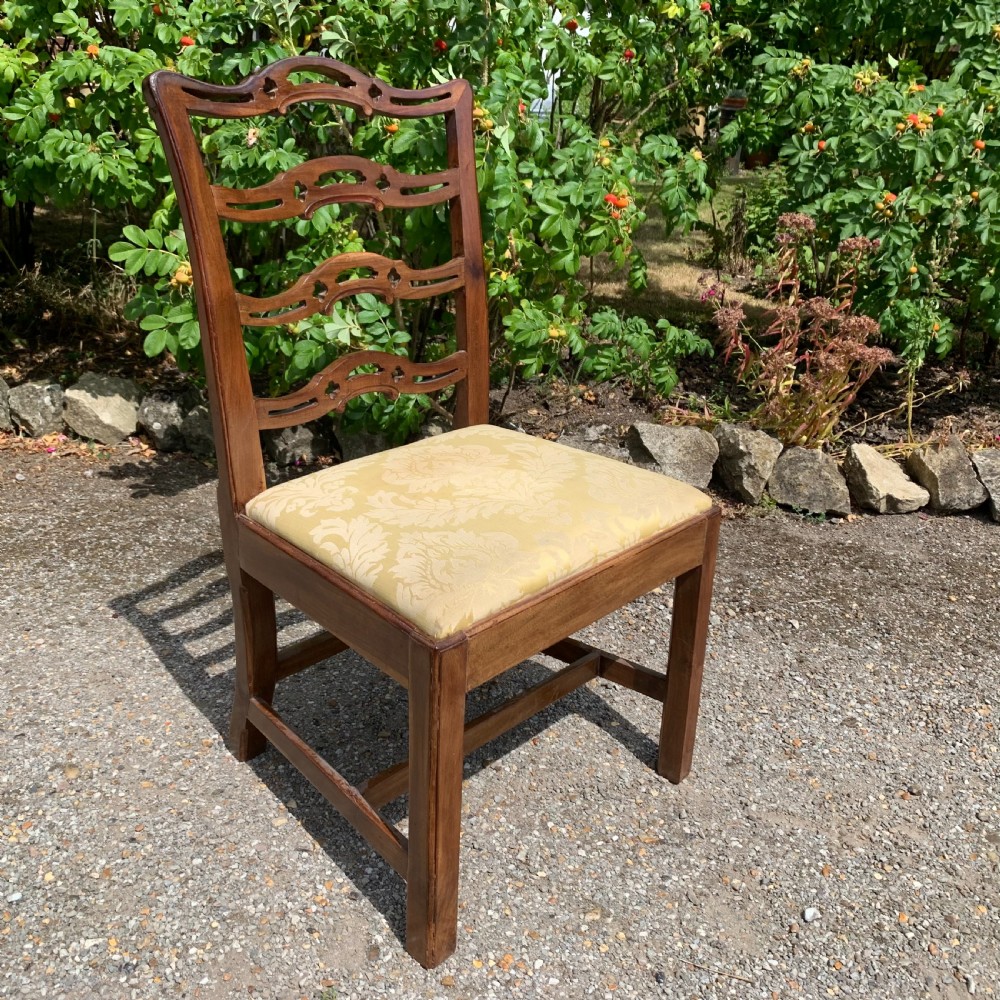 Set of eight mahogany Chippendale style ladder-back dining chairs View IX