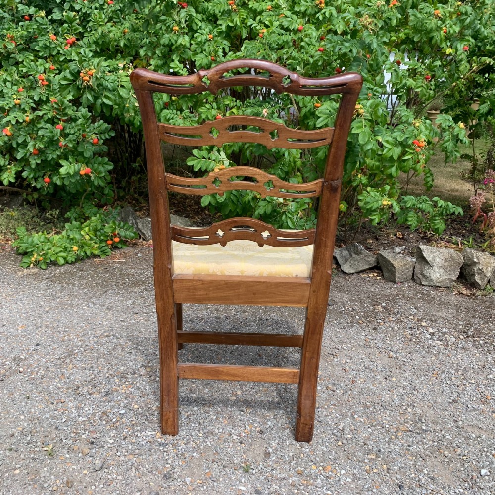 Set of eight mahogany Chippendale style ladder-back dining chairs View XI