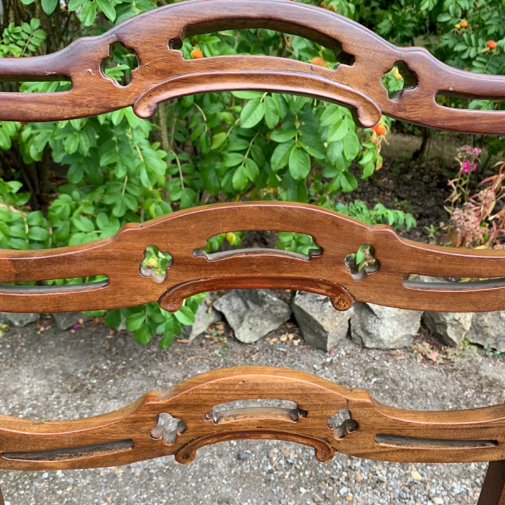 Set of eight mahogany Chippendale style ladder-back dining chairs View XIV
