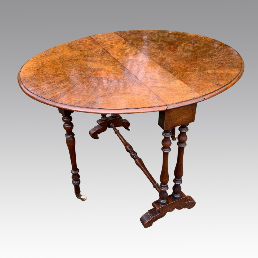 Burr walnut oval Sutherland table