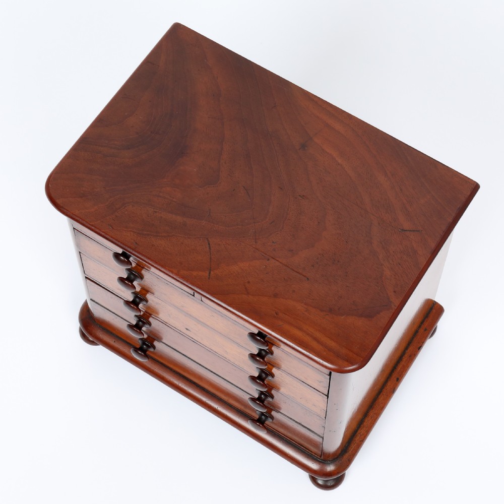 Georgian miniature mahogany chest of drawers View IV