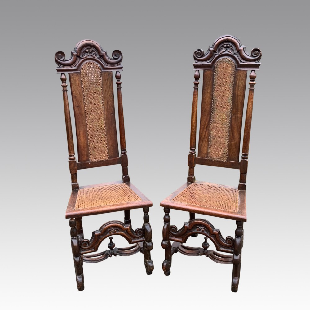 Pair of mid 19th century Carolean style high back walnut chairs