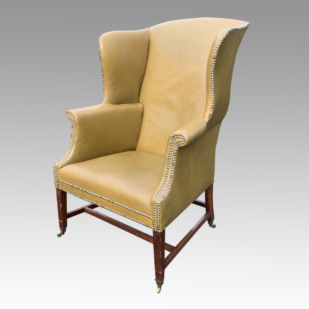 George II mahognay wing armchair in leather