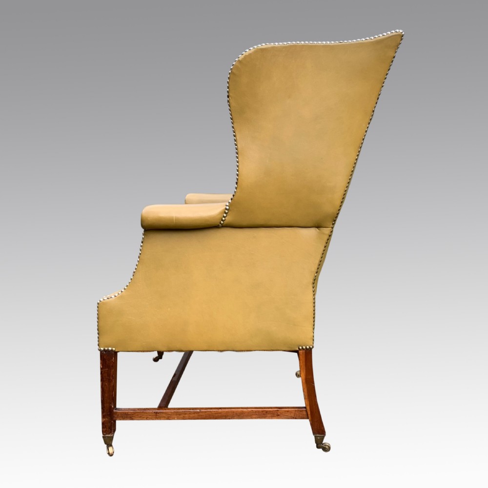 George II mahognay wing armchair in leather View II