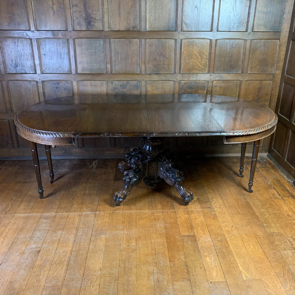 Extending Oak Dining Table with carved base