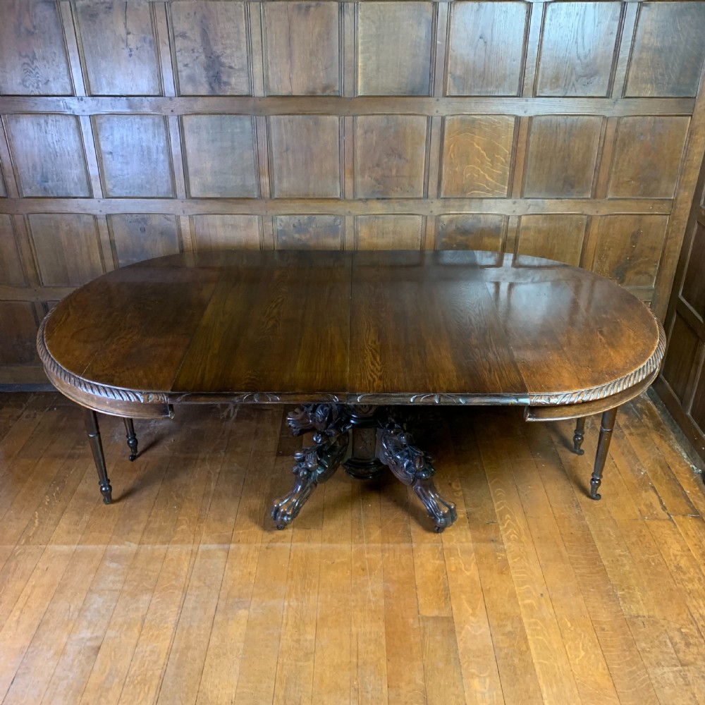 Extending Oak Dining Table with carved base View II