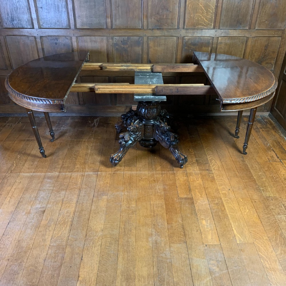 Extending Oak Dining Table with carved base View V