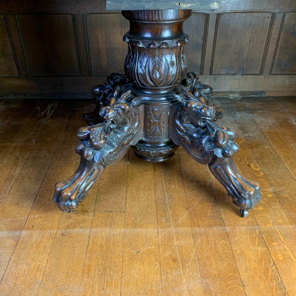Extending Oak Dining Table with carved base View VII
