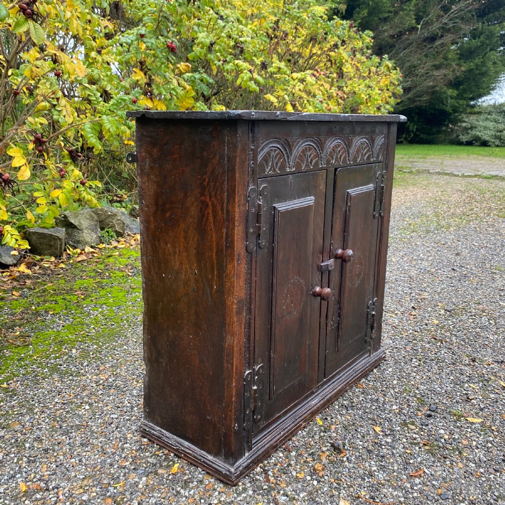 Small carved Oak Cupboard dated 1680 View III