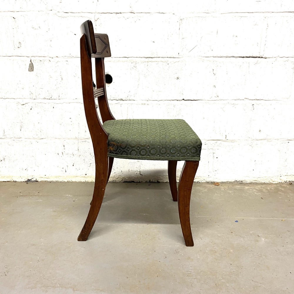 Set of twelve 12/10 ten Regency period mahogany dining chairs View II