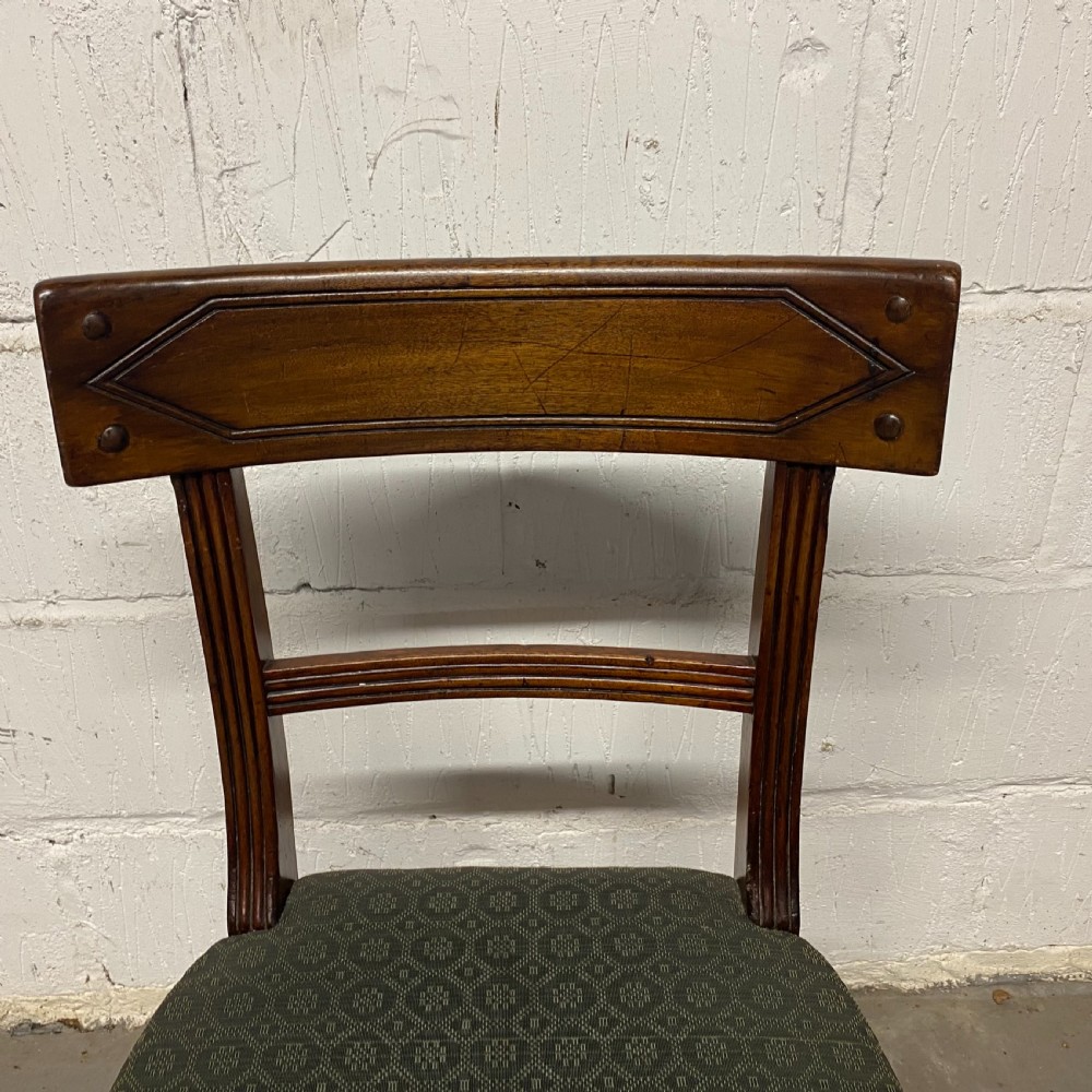 Set of twelve 12/10 ten Regency period mahogany dining chairs View X