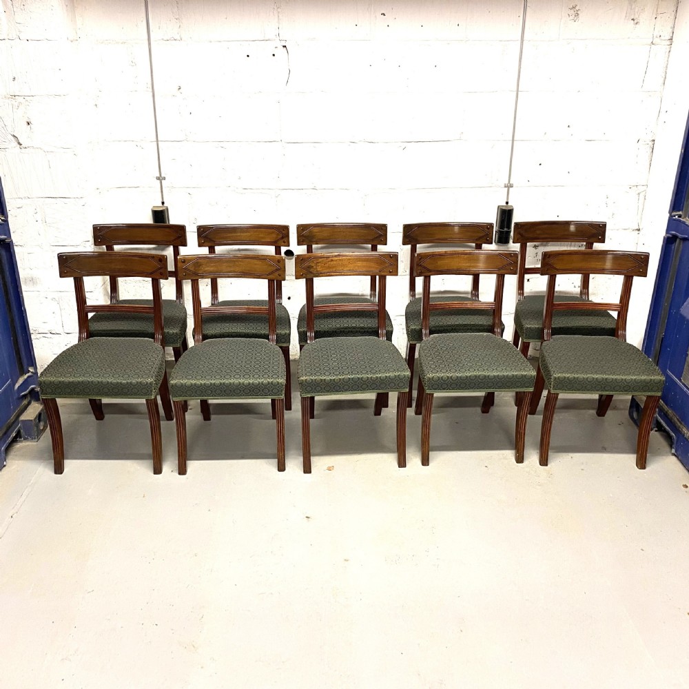 Set of twelve 12/10 ten Regency period mahogany dining chairs View XII
