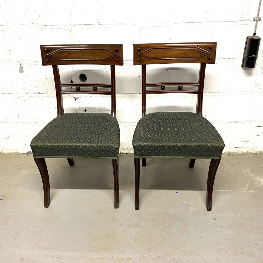 Set of twelve 12/10 ten Regency period mahogany dining chairs View XVII