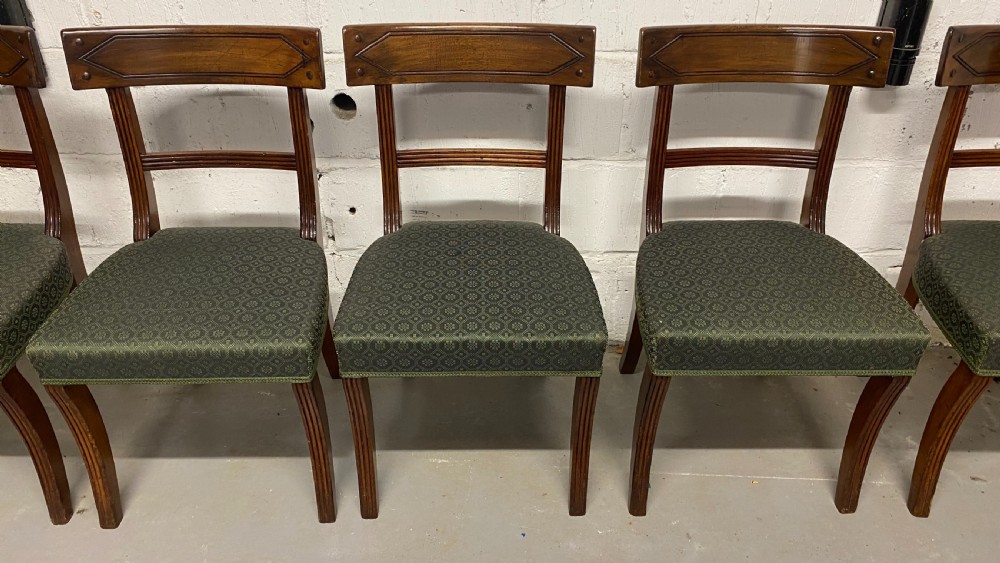 Set of twelve 12/10 ten Regency period mahogany dining chairs View XVIII
