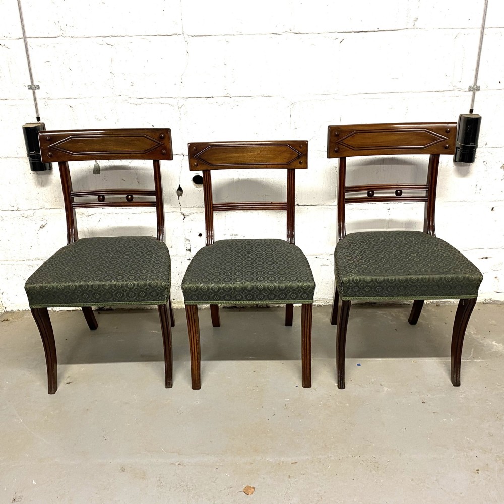 Set of twelve 12/10 ten Regency period mahogany dining chairs View XX