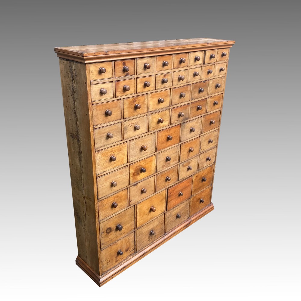 Pine Seed Merchant's or hardware shopkeeper's cabinet  r Bank of Drawers View III