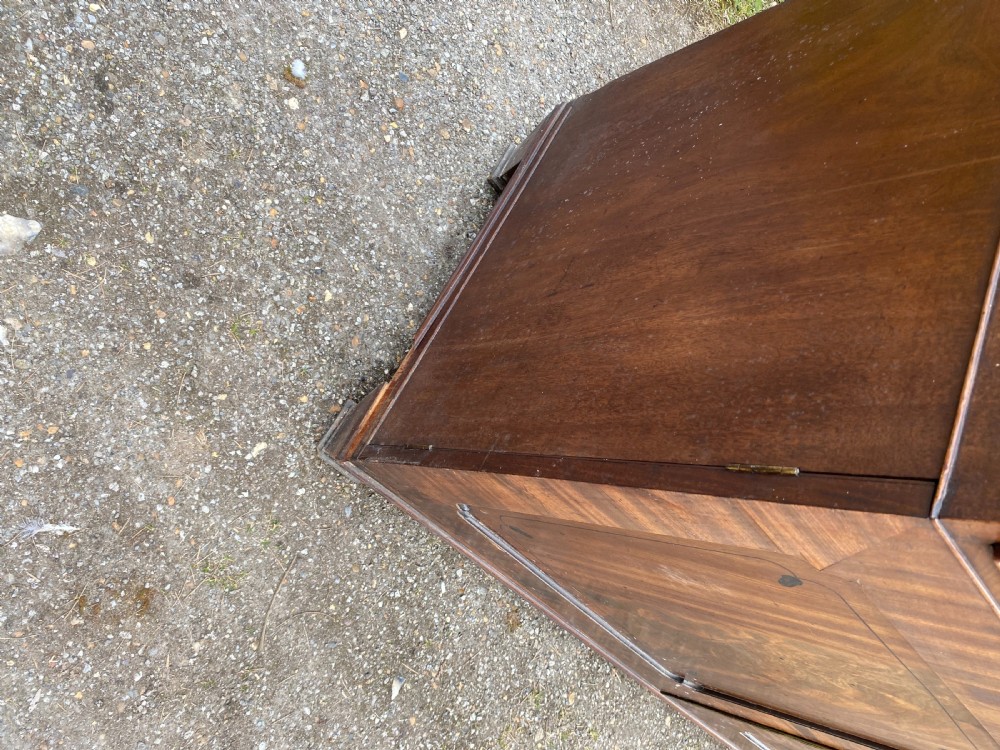 George IV mahogany secretaire bookcase with gothic arch astragal glazed upper doors, a deep secretaire drawer, and a lower two-door cupboard. View XIII