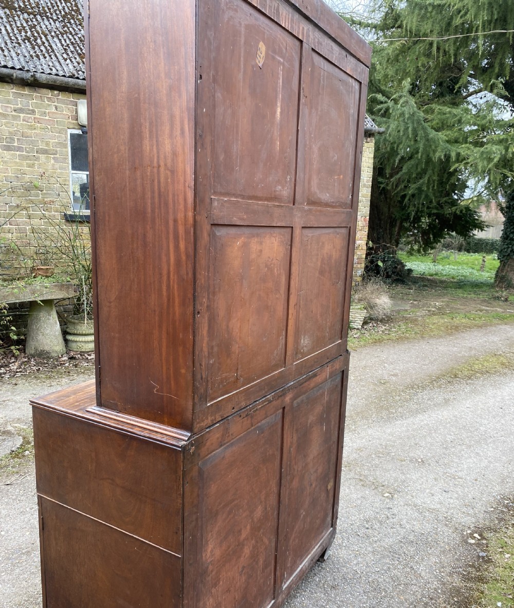 George IV mahogany secretaire bookcase with gothic arch astragal glazed upper doors, a deep secretaire drawer, and a lower two-door cupboard. View XXI