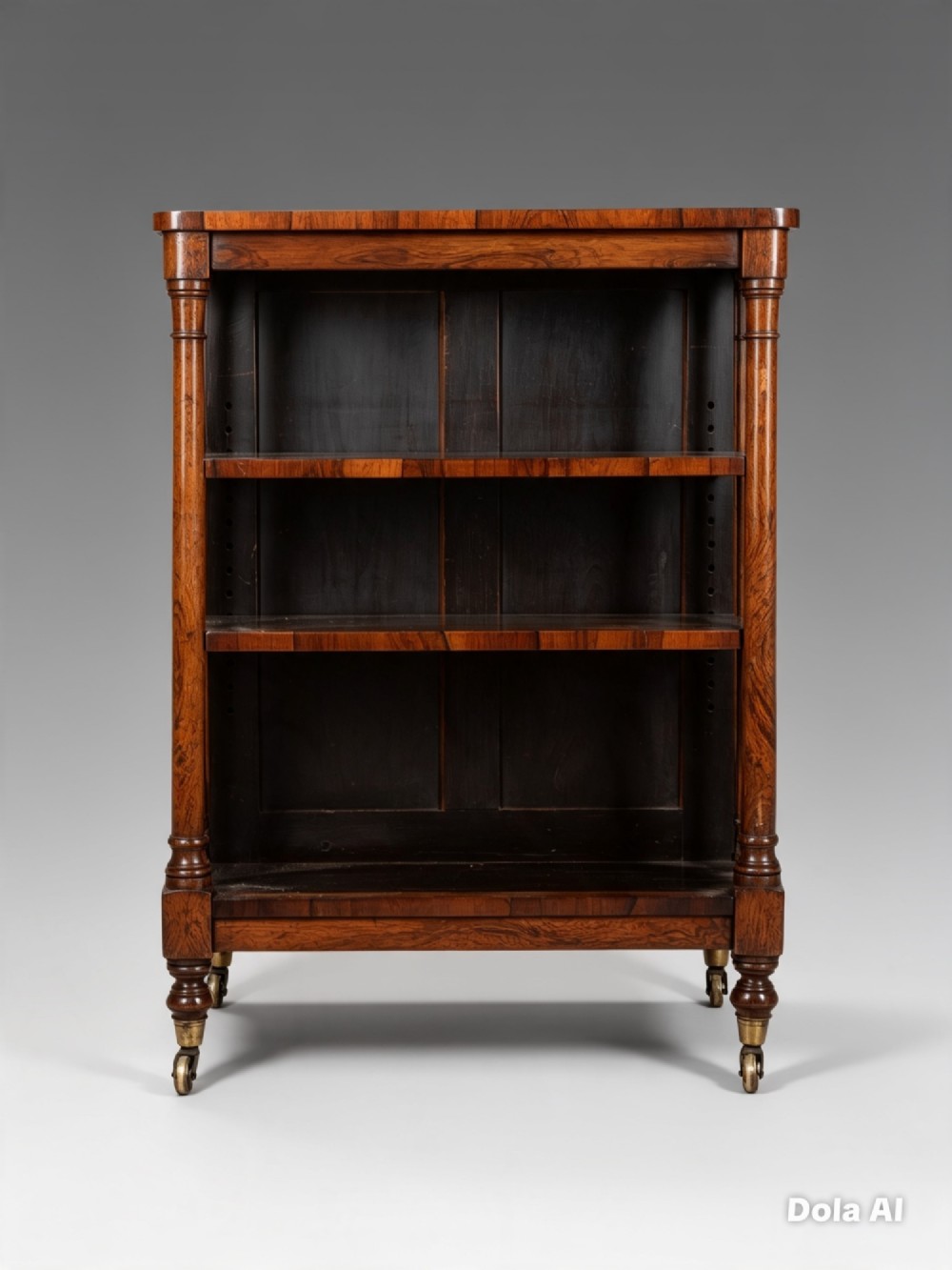 A 19th-century double-sided rosewood open bookcase featuring turned spindle columns, three open shelves, and brass castors. View VIII
