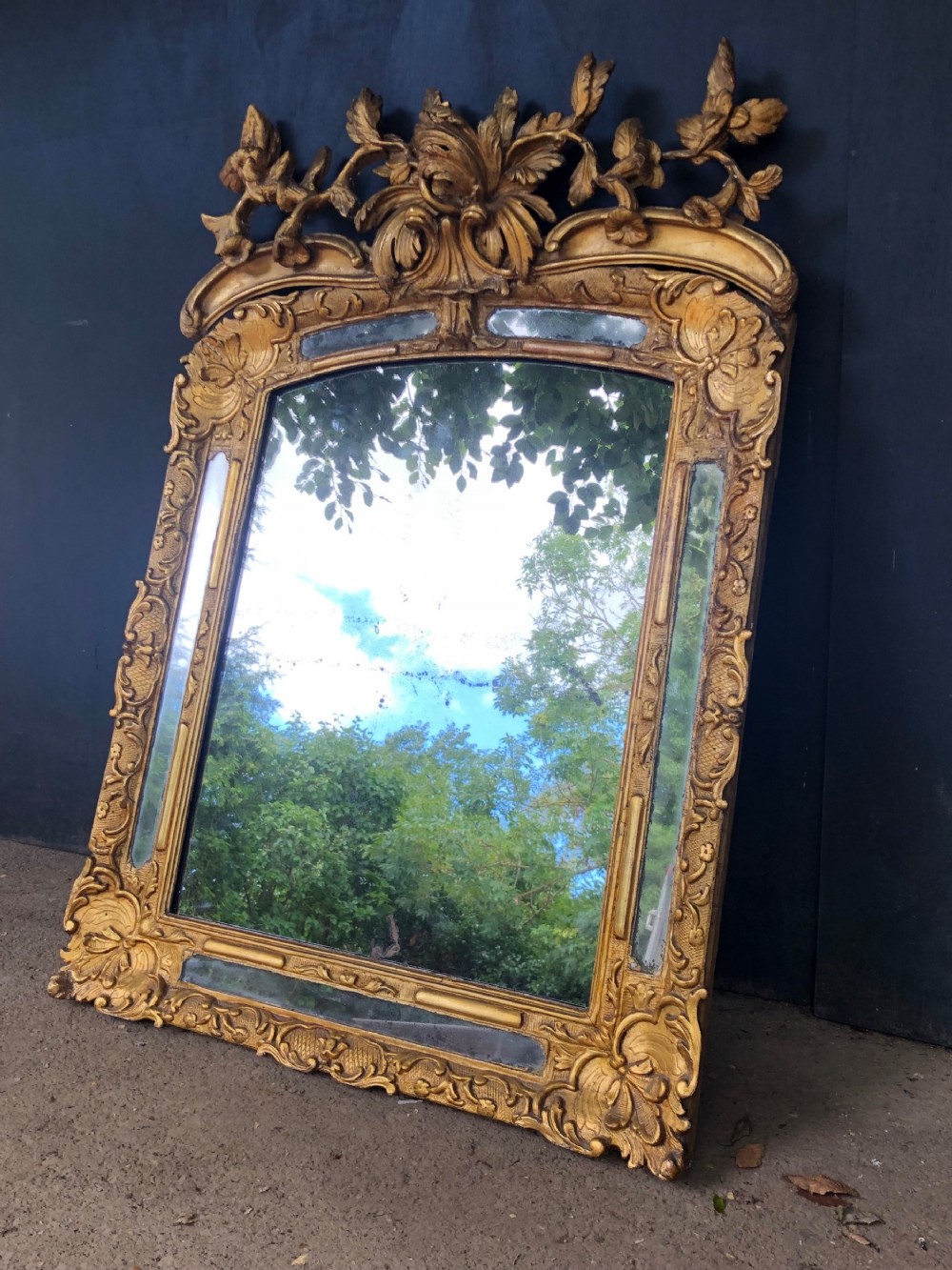 French Louis XIV style mid 18th century giltwood marginal mirror