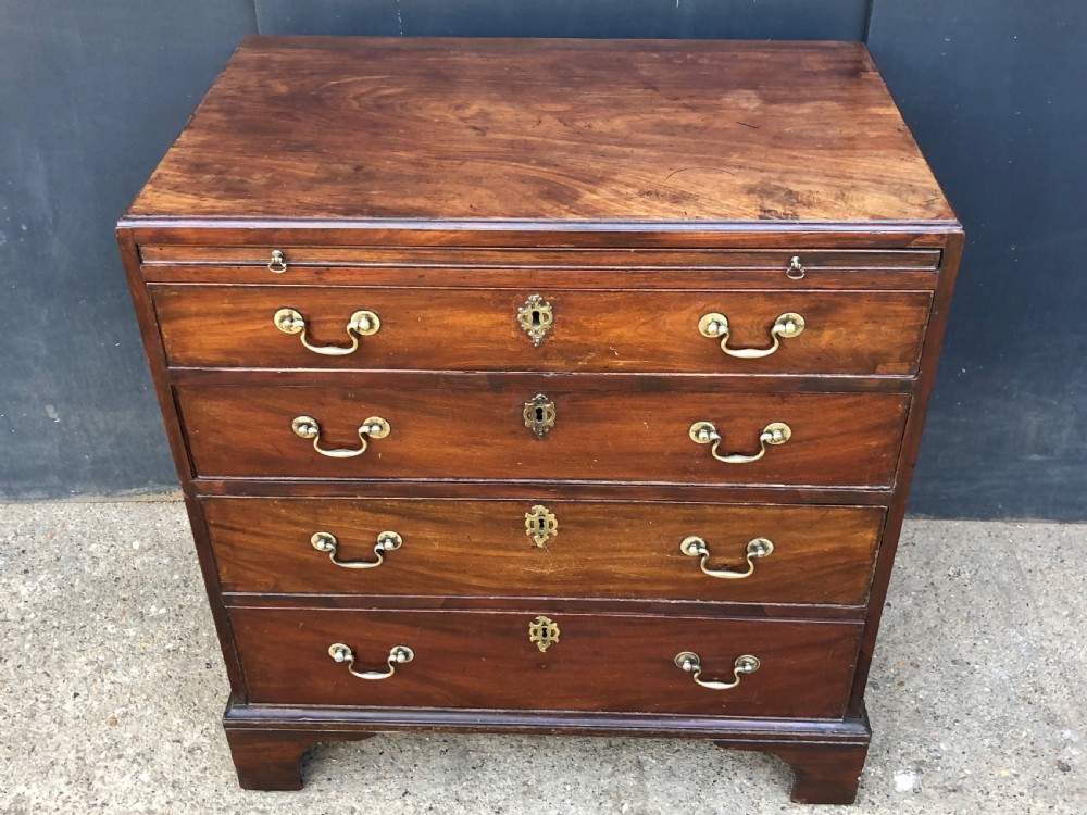 Caddy top mahogany bachelors chest with slide. View V