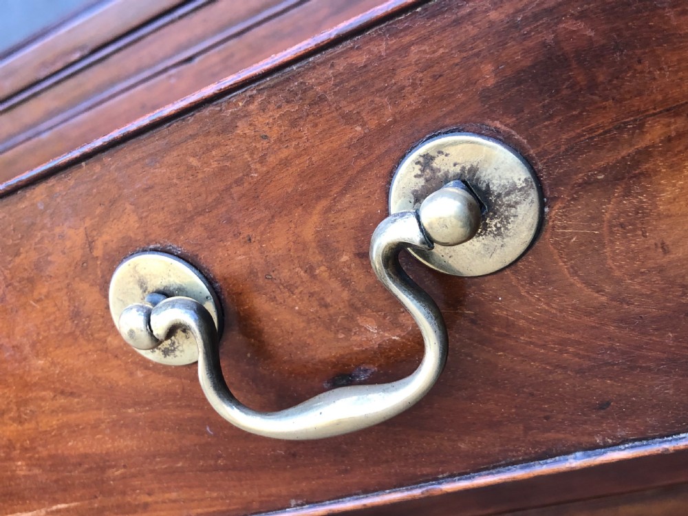 Caddy top mahogany bachelors chest with slide. View XVI
