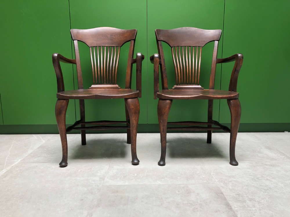 Pair of early 20th century oak desk chairs by Simpoles of Manchester View III
