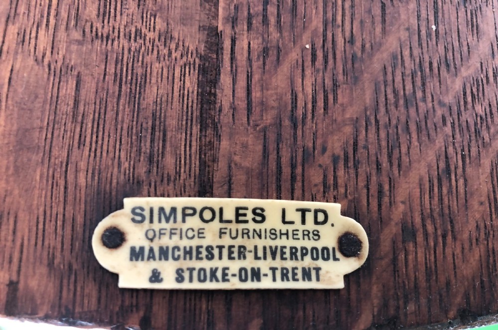 Pair of early 20th century oak desk chairs by Simpoles of Manchester View VI