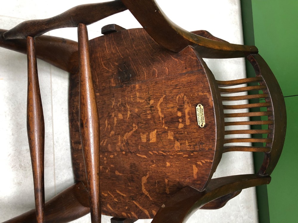 Pair of early 20th century oak desk chairs by Simpoles of Manchester View VIII