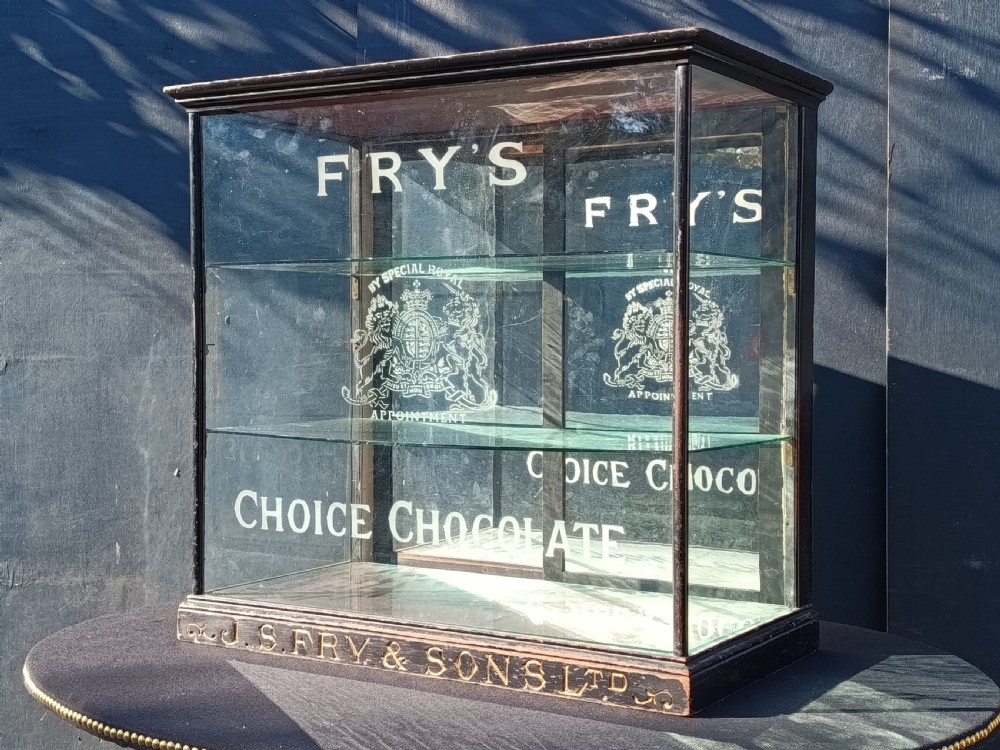 Fry's ebonised and gilt chocolate shop cabinet