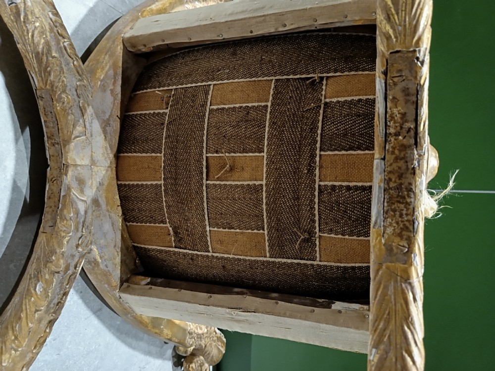 A giltwood curule window seat. View VIII