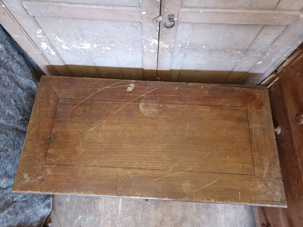 An early 19th-century painted pine mule chest featuring a top hinged coffer lid, a single lower drawer with two turned wooden knobs, and keyhole escutcheons. View VIII