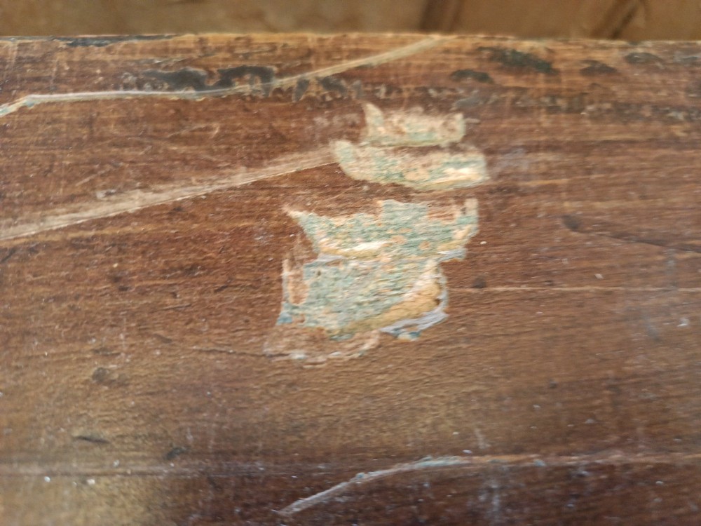 An early 19th-century painted pine mule chest featuring a top hinged coffer lid, a single lower drawer with two turned wooden knobs, and keyhole escutcheons. View XII