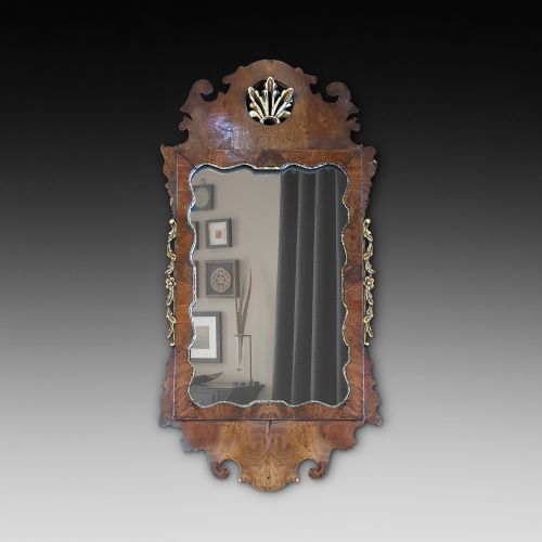 George II Walnut and Parcel Gilt Mirror