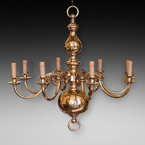 A Large Brass Eight Branch Chandelier