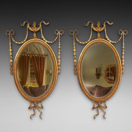 Pair of Edwardian Adam Revival Carved Gilt Wood and Gesso Wall Mirrors