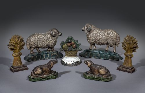An Ensemble of  7cast Iron Door Stops