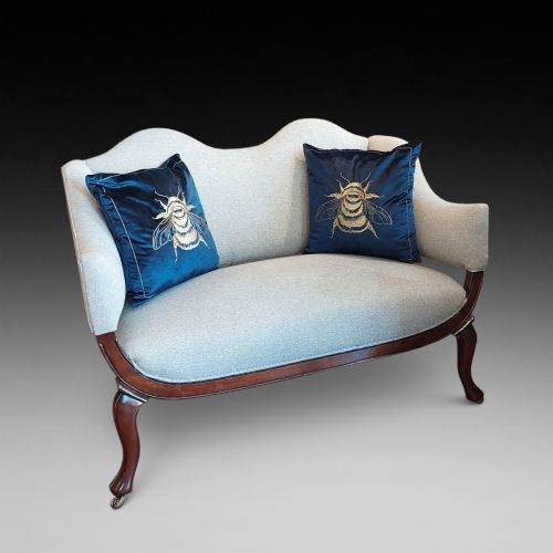 Late Victorian Upholstered Mahogany Camel Back Settee