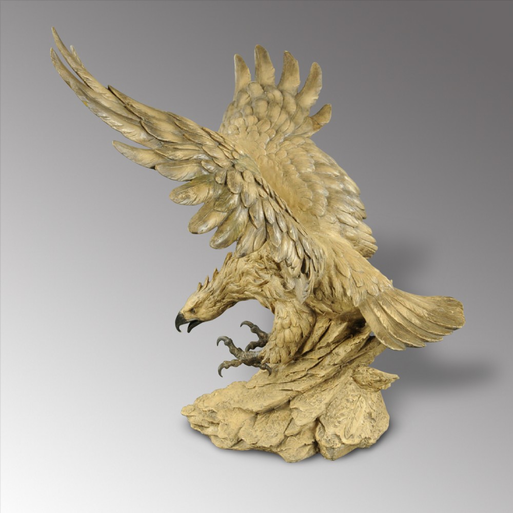 A large cast sculpture of an eagle