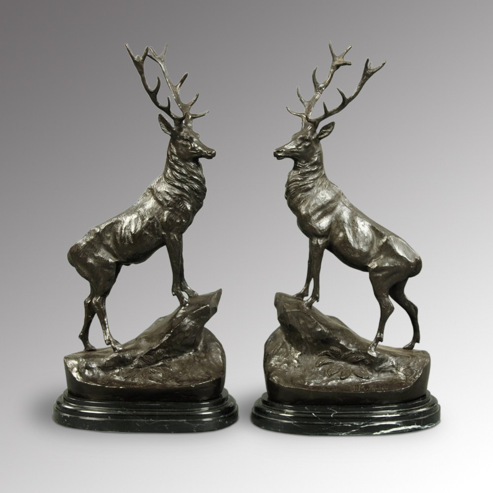 After Jules Moigniez (French: 1835-1894) A pair of bronze stags on marble bases